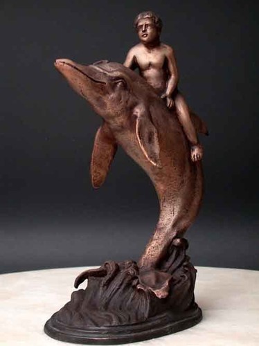 Bronze boy riding dolphin - boy,