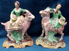 Pair of Staffordshire Flower Sellers Riding Goats
