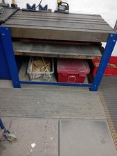 engineers cast iron surface plate with holding slots on steel legs 36 inch high
