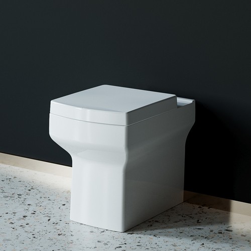 Back wall toilet btw - back,