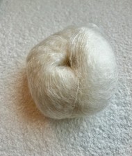 A mix of Kid Mohair (78%)