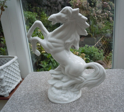 White ceramic rearing horse - white,