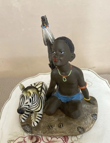 Maasai boy with zebra resin - boy,