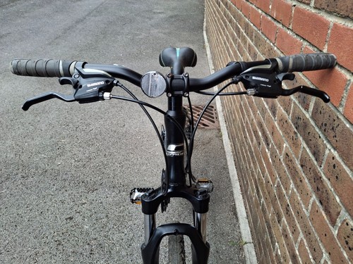 Used black carrera bike - carrera,