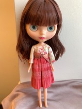 Blythe doll with clothes, and