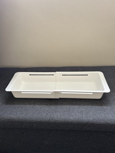 Expanding drawer insert