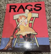 GALLERY GRAPHICS Vintage Book Rags Book Doll