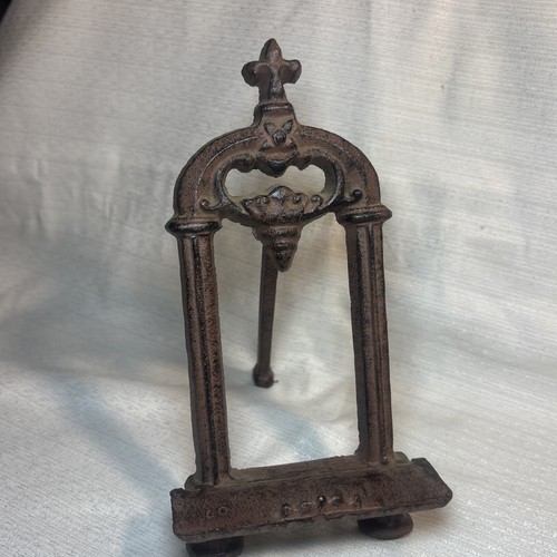 Ornate cast iron easel display - iron,