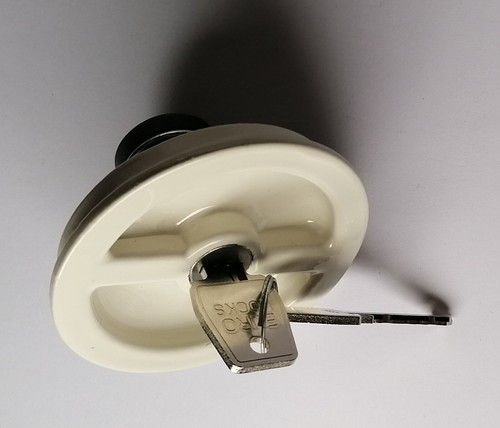 This locking petrol cap - a,