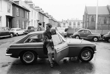 Prince of Wales steps out of own blue MGC car after driving hi- 1969 Old Photo