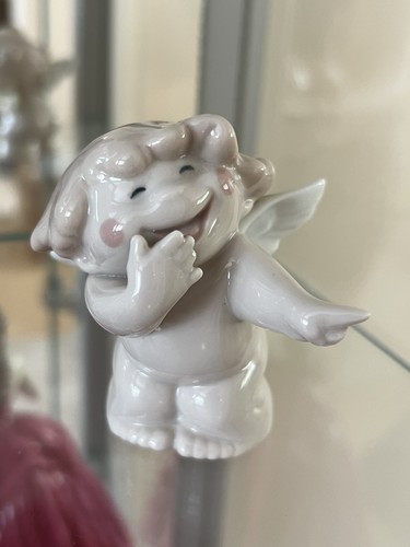 Nao lladro cheeky cherubs - by,