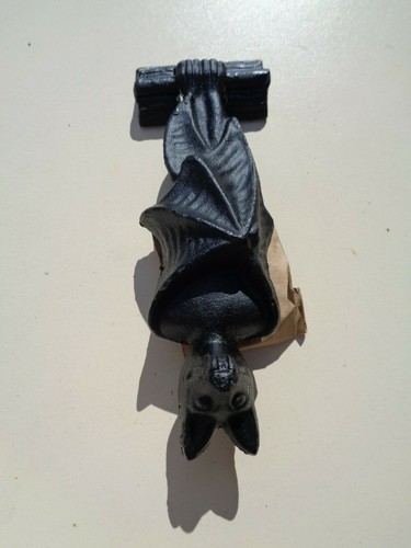Attractive cast iron bat door - iron,