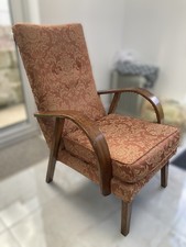 Beautiful Art déco wooden armchair with orange cushion and embrodery details
