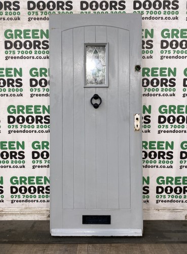 Wooden cottage front door - front,