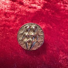  a vintage button or cufflink