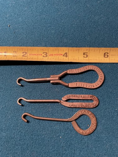 Four vintage shoe button hooks - four,