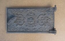 Antique cast iron door with frame for wood burning stove