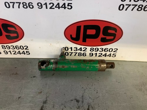Front mowing cylinder lift - , ram