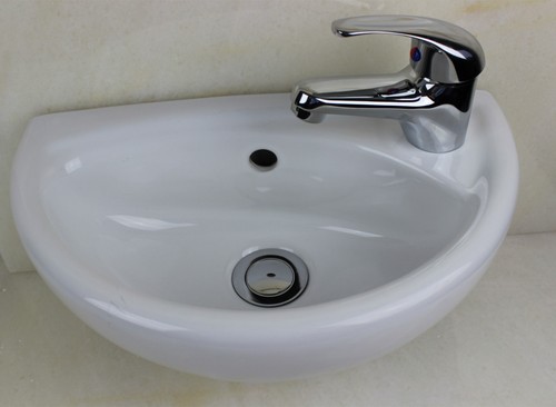 Compact wall hung cloakroom - hung,