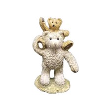 Sherratt & Simpson. Bear sat on dad's shoulders