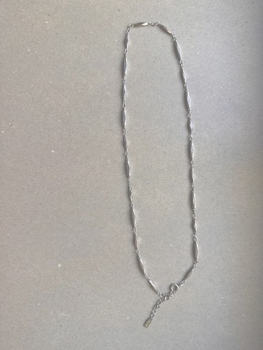 Nikken silver tone - diamond, cut