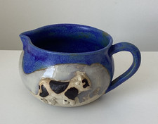 Signed Studio Pottery Milk Jug with a 3D cow image on the front - Unusual