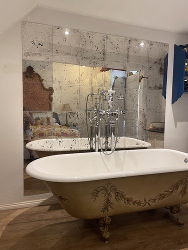 Distressed mirror tiles