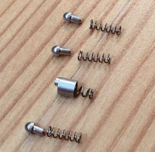 Bezel Click Springs and Rivets