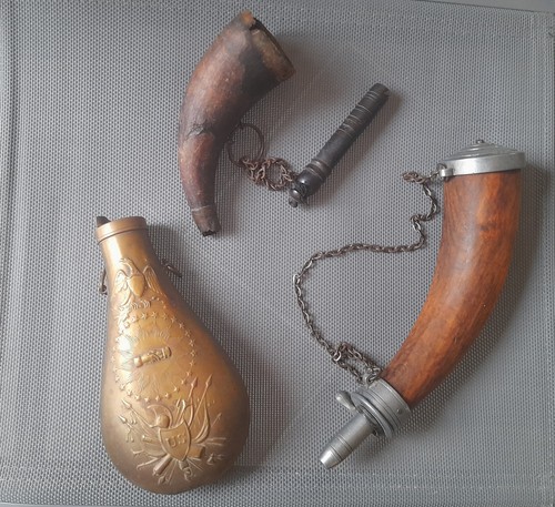 Black powder flasks two - two, are