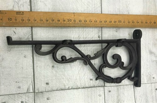 Pair cast iron ornate - of,