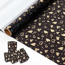 Black and gold wrapping paper - and,