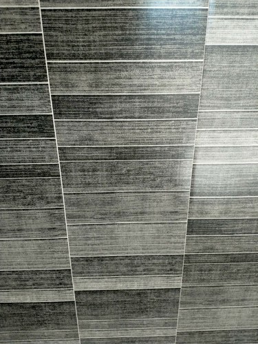Dark grey small tile bathroom - dark,