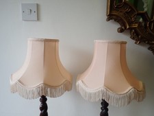 Pair of pale pink fringe lamp