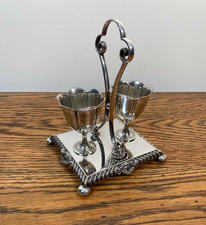 ANTIQUE SHELL FORM RIM SILVER