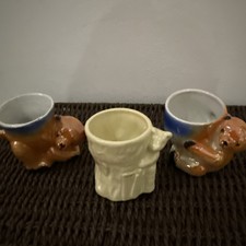 3 BEAR EGG CUPS- one is Sooty