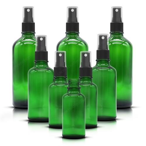 Green glass spray bottle with - spray,
