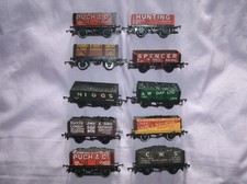10 Open Coal Wagons With Trade Emblems