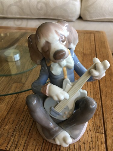 Lladro dog playing guitar - lladro,