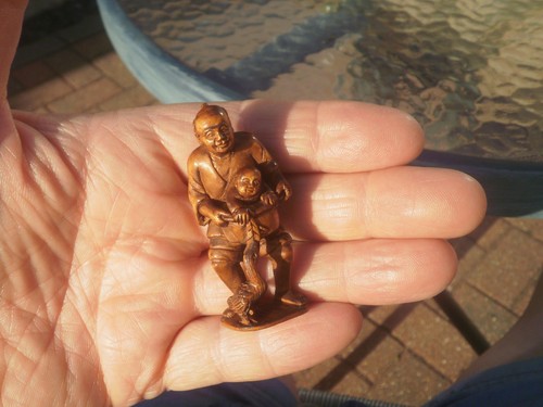 Hand carved wood netsuke man - wood,
