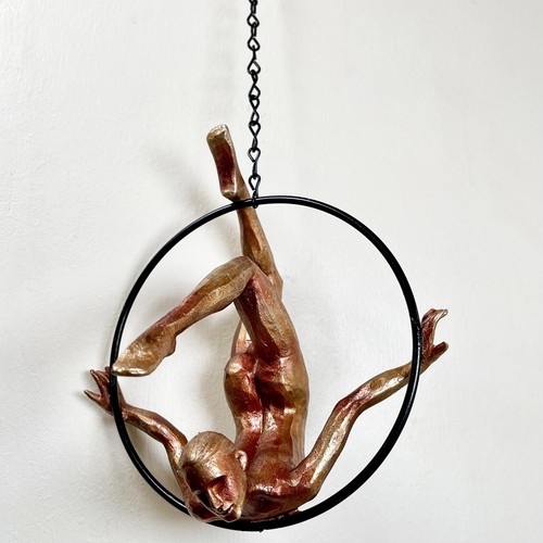 Hanging bronze acrobat - hanging,