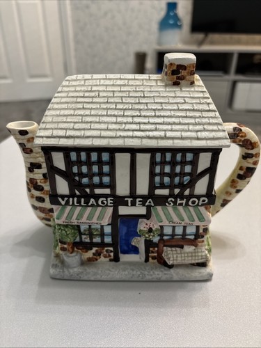 Village tea shop teapot - shop,