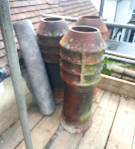 Brown clay chimney - clay,