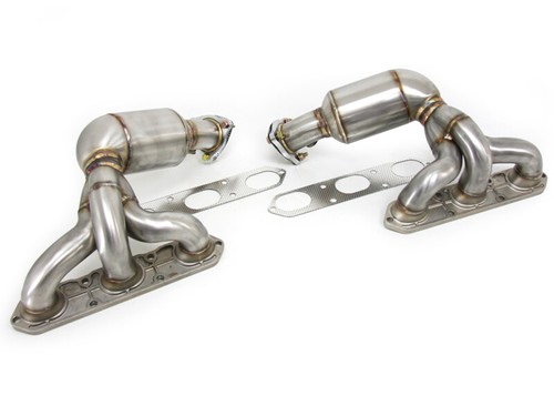 Exhaust manifold header - /,