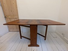 Oak drop-leaf dining table - opens to large rectangular table 152x91cm - 6 seat