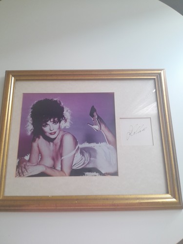 Framed autographed photo - framed,