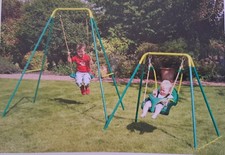 Green painted steel swing