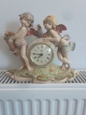 A 1970'S MANTLE CLOCK