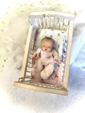 Polymer clay baby ,artist