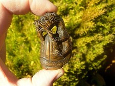 Hand Carved wood netsuke of a Dragon on viking's helmet collectable mythical fig