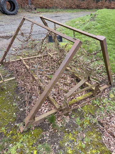 Tractor mounted chain - tractor, harrows